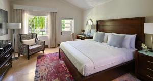 Кровать или кровати в номере Sandals Halcyon Beach All Inclusive - Couples Only