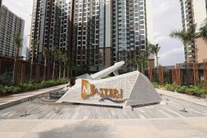 a bench with a sign on it in a city at Căn Hộ 2 Phòng Ngủ LUXURY-1816 in Gia Lâm Pho