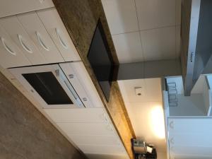Kuchyň nebo kuchyňský kout v ubytování Apartamento Rosendo