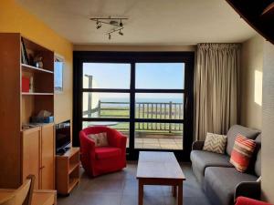 Posedenie v ubytovaní Duplex avec balcon, parking, animaux admis, et Wi-Fi - FR-1-675-2