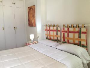 Postel nebo postele na pokoji v ubytování Apartamento Rosendo