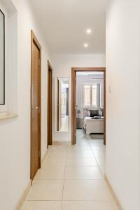 Ένα ή περισσότερα κρεβάτια σε δωμάτιο στο Modern apartment direct access to Sliema beaches