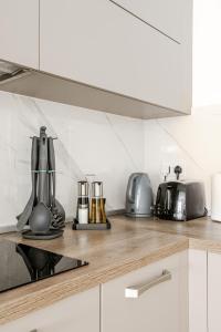 Η κουζίνα ή μικρή κουζίνα στο Modern apartment direct access to Sliema beaches
