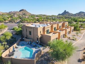 an aerial view of a home in the desert at Villas 2, 3 The Villas At Troon North in Scottsdale