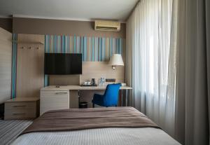 Posteľ alebo postele v izbe v ubytovaní Hotel Cristal Białystok