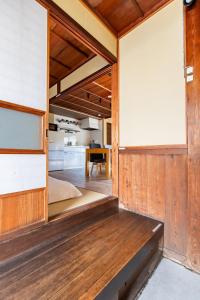 Manabi-stay Matsue客房内的一张或多张床位