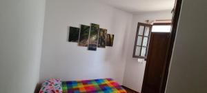 Giường trong phòng chung tại Bahía Muelle de Garachico