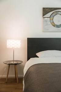 Voodi või voodid majutusasutuse BASELiving Apartment - St Jakob, near ESC - Bahnhof SBB toas
