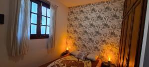 Giường trong phòng chung tại Bahía Muelle de Garachico