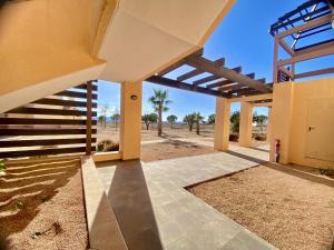 a view from the entrance of a building with a staircase at Oasis Slow Life H44 by Gloove in Fuente Alamo