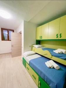 Postel nebo postele na pokoji v ubytování Casa Vacanze Relax e Mare vicino a Cagliari in Sardegna