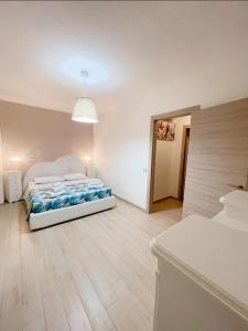 Postel nebo postele na pokoji v ubytování Casa Vacanze Relax e Mare vicino a Cagliari in Sardegna