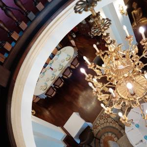 an overhead view of a dining room with a chandelier at Castle Garden in Szombathely