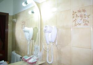 Phòng tắm tại Hotel Natalina