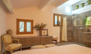 a bathroom with a shower and a sink at I Carbonni - Bergerie 80m2 entre mer et montagne in Sotta +7 photos