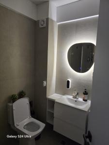 Koupelna v ubytování la mare + 4 fotografie