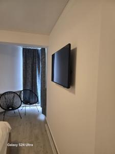 TV a/nebo společenská místnost v ubytování la mare