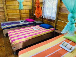 Katil atau katil-katil dalam bilik di Sigiriya Rastha Hostel