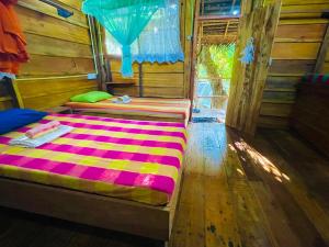 Katil atau katil-katil dalam bilik di Sigiriya Rastha Hostel
