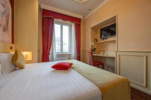 Posteľ alebo postele v izbe v ubytovaní Al Viminale Hill Inn & Hotel