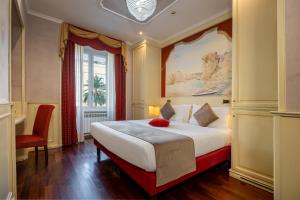 Posteľ alebo postele v izbe v ubytovaní Al Viminale Hill Inn & Hotel