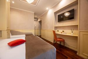 Posteľ alebo postele v izbe v ubytovaní Al Viminale Hill Inn & Hotel