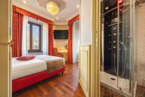 Posteľ alebo postele v izbe v ubytovaní Al Viminale Hill Inn & Hotel
