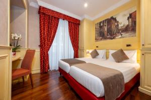 Posteľ alebo postele v izbe v ubytovaní Al Viminale Hill Inn & Hotel