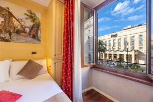 Posteľ alebo postele v izbe v ubytovaní Al Viminale Hill Inn & Hotel