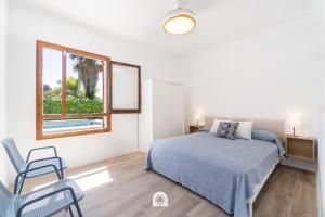 Ένα ή περισσότερα κρεβάτια σε δωμάτιο στο Mediterranean Way - La Mora B-C +35 φωτογραφίες