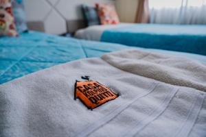 Letto o letti in una camera di Hotel Casa Kolping Quito