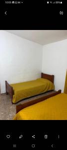 Ένα ή περισσότερα κρεβάτια σε δωμάτιο στο Elrincondemaximo