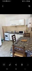 Η κουζίνα ή μικρή κουζίνα στο Elrincondemaximo