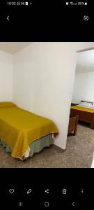 Ένα ή περισσότερα κρεβάτια σε δωμάτιο στο Elrincondemaximo +2 φωτογραφίες