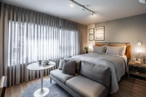 Cama ou camas em um quarto em Noon Vila Madalena
