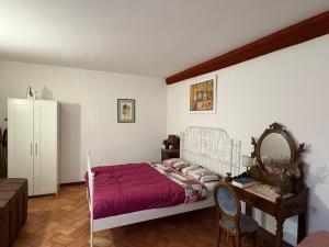 A bed or beds in a room at Renaissance Boutique House