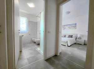 Postel nebo postele na pokoji v ubytování New Apartment Lazise