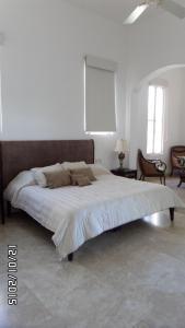 Tempat tidur dalam kamar di Mansiones Cruz del Mar
