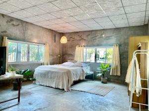 Ένα ή περισσότερα κρεβάτια σε δωμάτιο στο Tiny Loft Style House