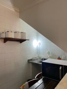 Η κουζίνα ή μικρή κουζίνα στο Casa próxima ao centro de convenções da UFOP