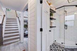 a bathroom with a walk in shower and a walk in shower at Casa Del Sol - Private Beachfront, Pool Table in Clearwater Beach +33 photos