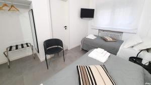 Ένα ή περισσότερα κρεβάτια σε δωμάτιο στο Akita Suite