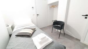 Postel nebo postele na pokoji v ubytování Akita Suite