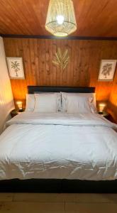 Postel nebo postele na pokoji v ubytování L'appel Chalet