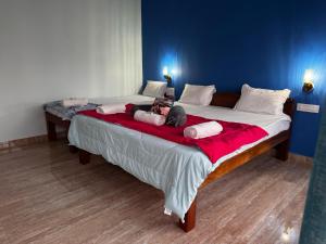 Postel nebo postele na pokoji v ubytování Budha Home Stay + 36 fotografií