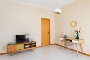 Μια τηλεόραση ή/και κέντρο ψυχαγωγίας στο Villa Vintage 8 posti "Emozioni del passato"