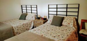 A bed or beds in a room at Shui wu, la casita del agua