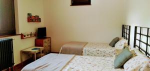 A bed or beds in a room at Shui wu, la casita del agua