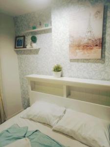 Ένα ή περισσότερα κρεβάτια σε δωμάτιο στο Seaview 1bedroom 23sqm pattaya 1112
