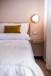 A bed or beds in a room at Residence Sabrina